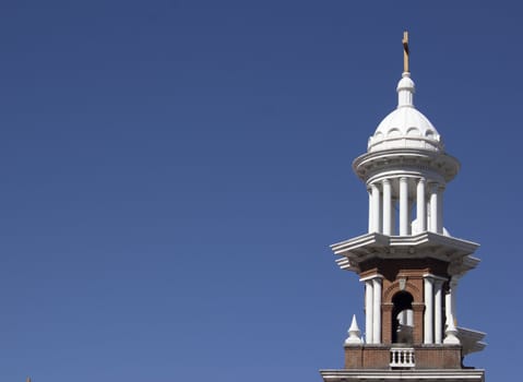 A vintage old church with blue skies