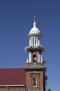 A vintage old church with blue skies