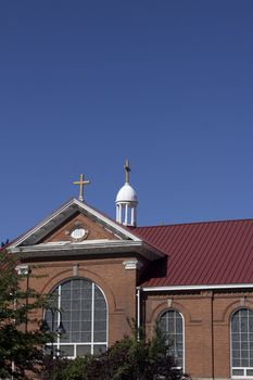 A vintage old church with blue skies