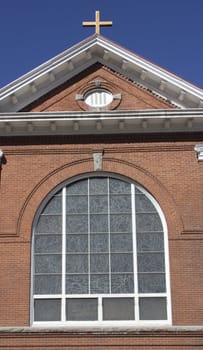 A vintage old church with blue skies