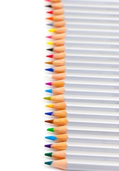Multicolored Pencil, Arrangement in Row over white