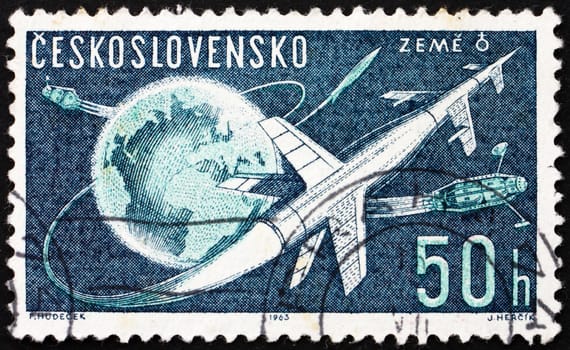 CZECHOSLOVAKIA - CIRCA 1963: a stamp printed in the Czechoslovakia shows Rockets and Sputniks Leaving Earth,  circa 1963