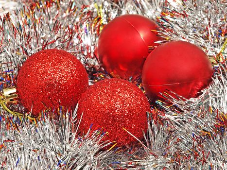 Red christmas balls and silver decoration. 