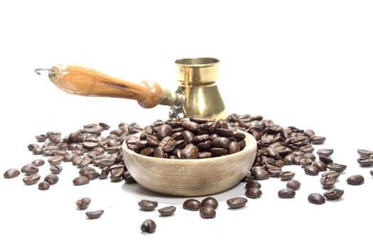 Fresh roasted coffee beans on a white background