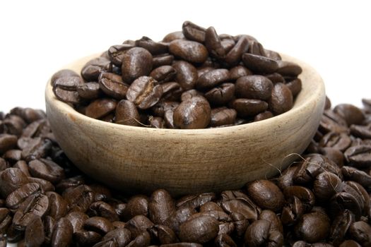 Fresh roasted coffee beans on a white background