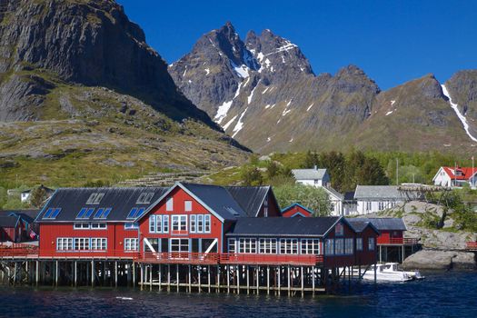 Picturesque village on Lofoten islands in Norway surrounded by mountains