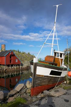 Fishing boat in village on Lofoten islands in Norway