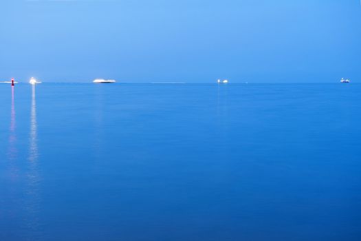 Ships floating on the blue water