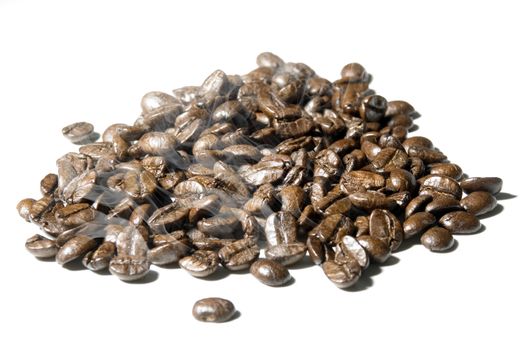 Fresh roasted coffee beans on a white background