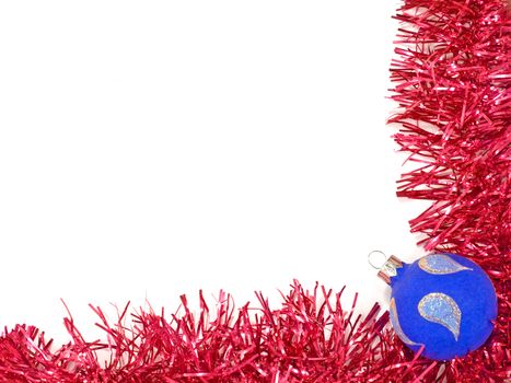 Blue christmas ball and red decoration on white background.
