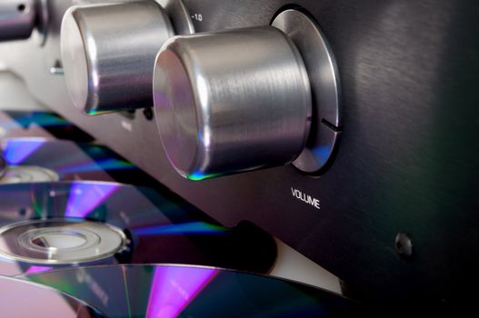 Audio - Closeup of Amplifier and CD Compact Discs
