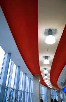 Hall of a modern business centre with set of glass show-windows