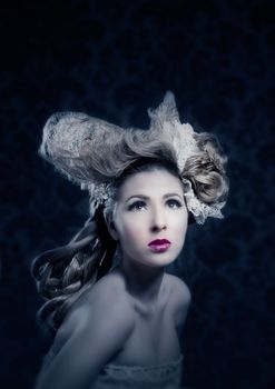 Hairdressing and makeup fashion woman on dark background