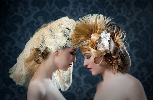 Hairdressing and makeup fashion two woman on dark background
