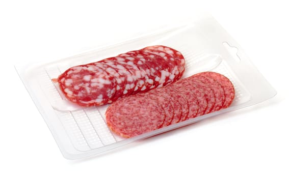 Slices Salami in container on a white background