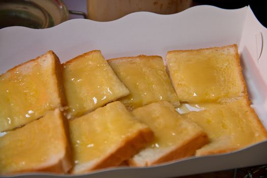 Sliced Sandwich bread on the electric grill