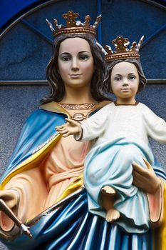 Baby Jesus sitting on hands Virgin Mary