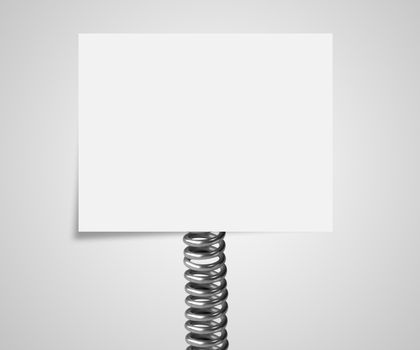 metal spring with note paper