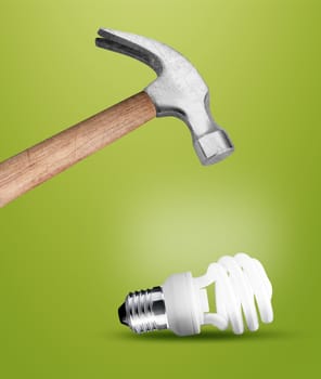 Hammer hitting a lightbulb .