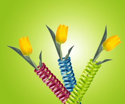 green metal spring with yellow tulip.