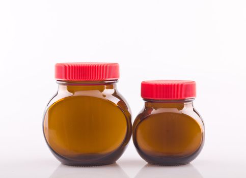 Empty glass bottles on white background