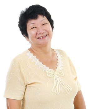 60s Asian senior woman smiling over white background