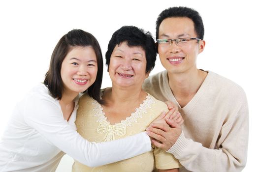 Asian senior mother and adult offsprings over white background