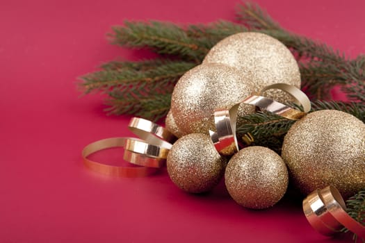 beautiful golden christmas decoration on red background sparkle