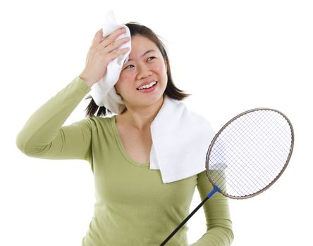 Asian female sweating after playing badminton game, over white background