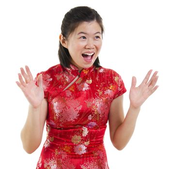 Happy oriental woman open her arms with surprising face over white background