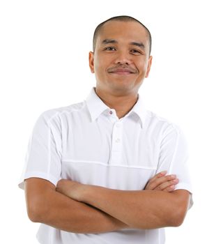 Confident 30s Southeast Asian man crossed arms isolated on white background