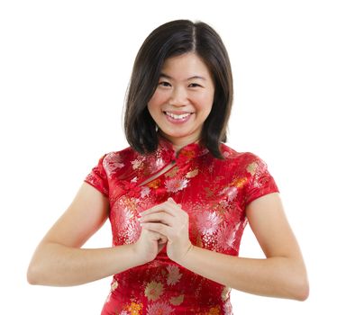 Oriental girl wishing you a happy Chinese new year over white background