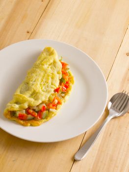 close up of a plate of stuffed omelette