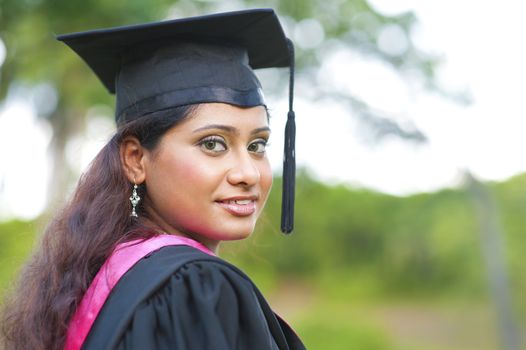 Young Asian Indian female smiling outdoor