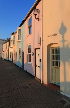 traditional row of terrace houseses with unique name in weymouth uk