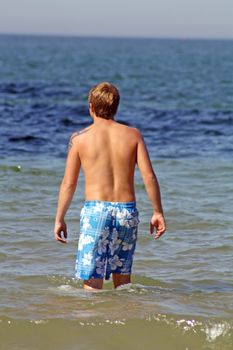 teenage boy in the sea