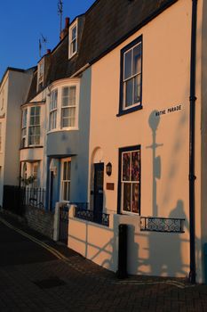 traditional row of terrace houseses with unique name in weymouth uk