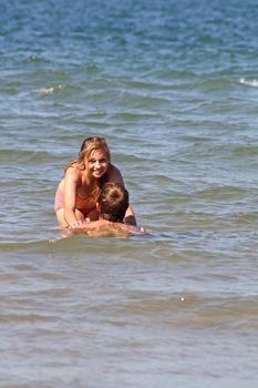 teenager in the sea at cromer england