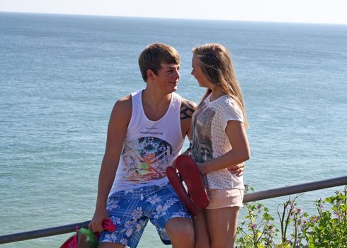 teenagers in love at the beach