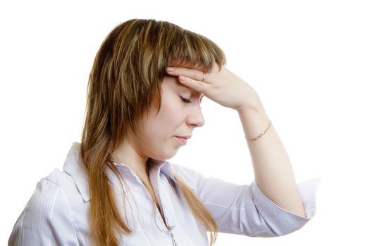 young woman with a headache on a white background