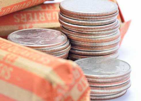 Macro closeup of a stack of quarters.