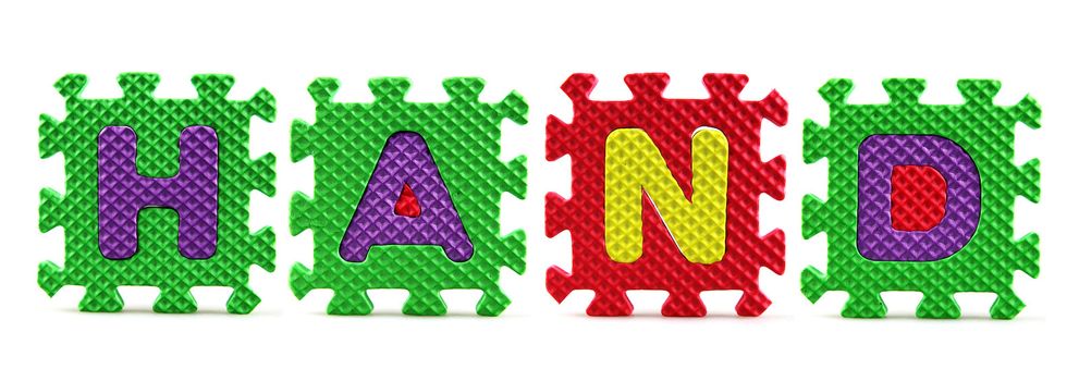 Alphabet puzzle pieces on white background