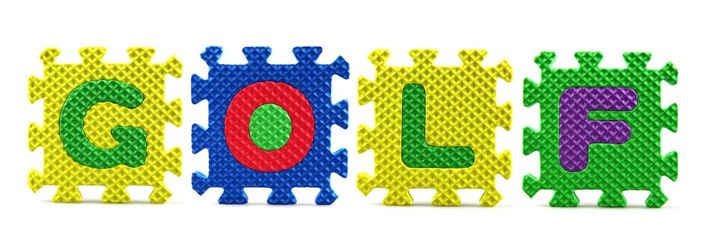 Alphabet puzzle pieces on white background