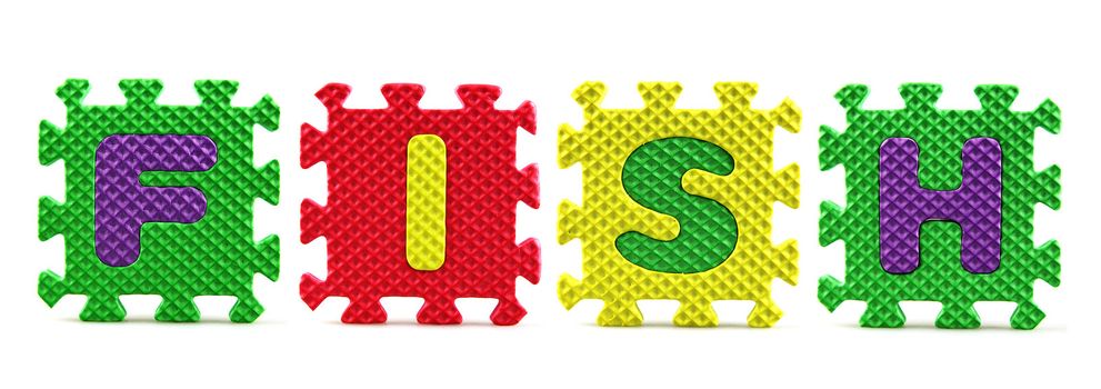 Alphabet puzzle pieces on white background