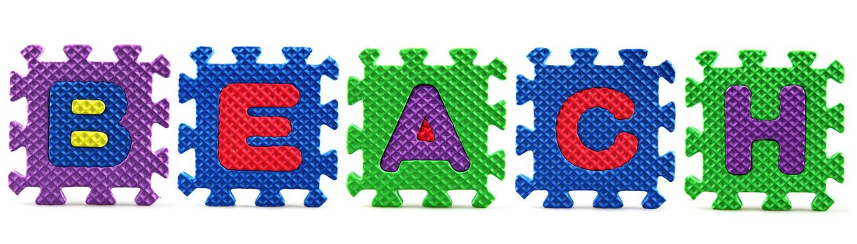 Alphabet puzzle pieces on white background