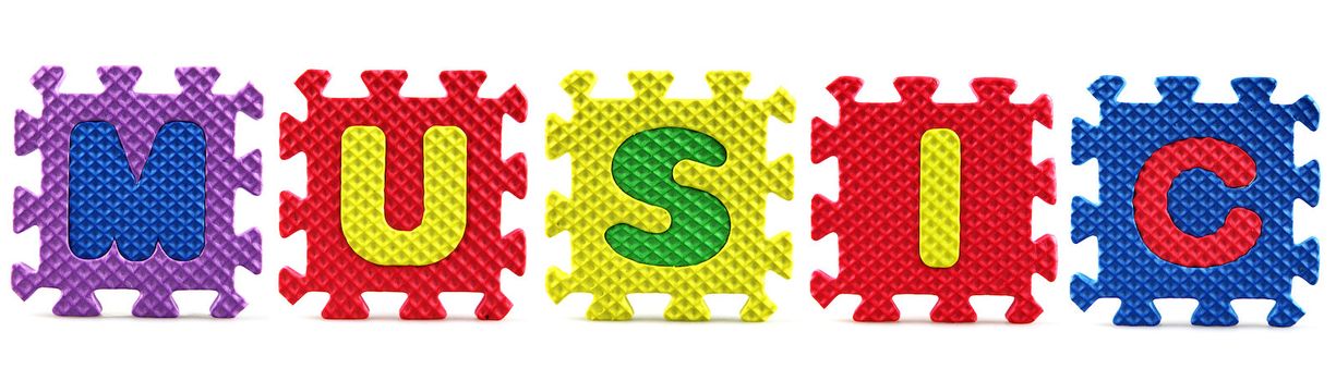 Alphabet puzzle pieces on white background