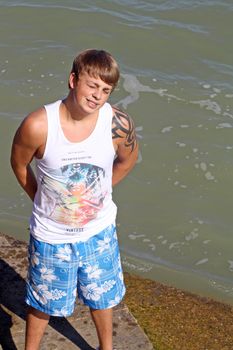 teenage boy by the sea at cromer england