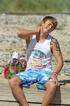 teenage boy by the sea at cromer england