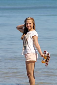 stunning teenage girl on the beach 