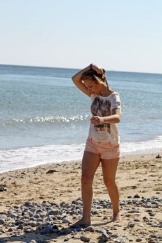 stunning teenage girl on the beach